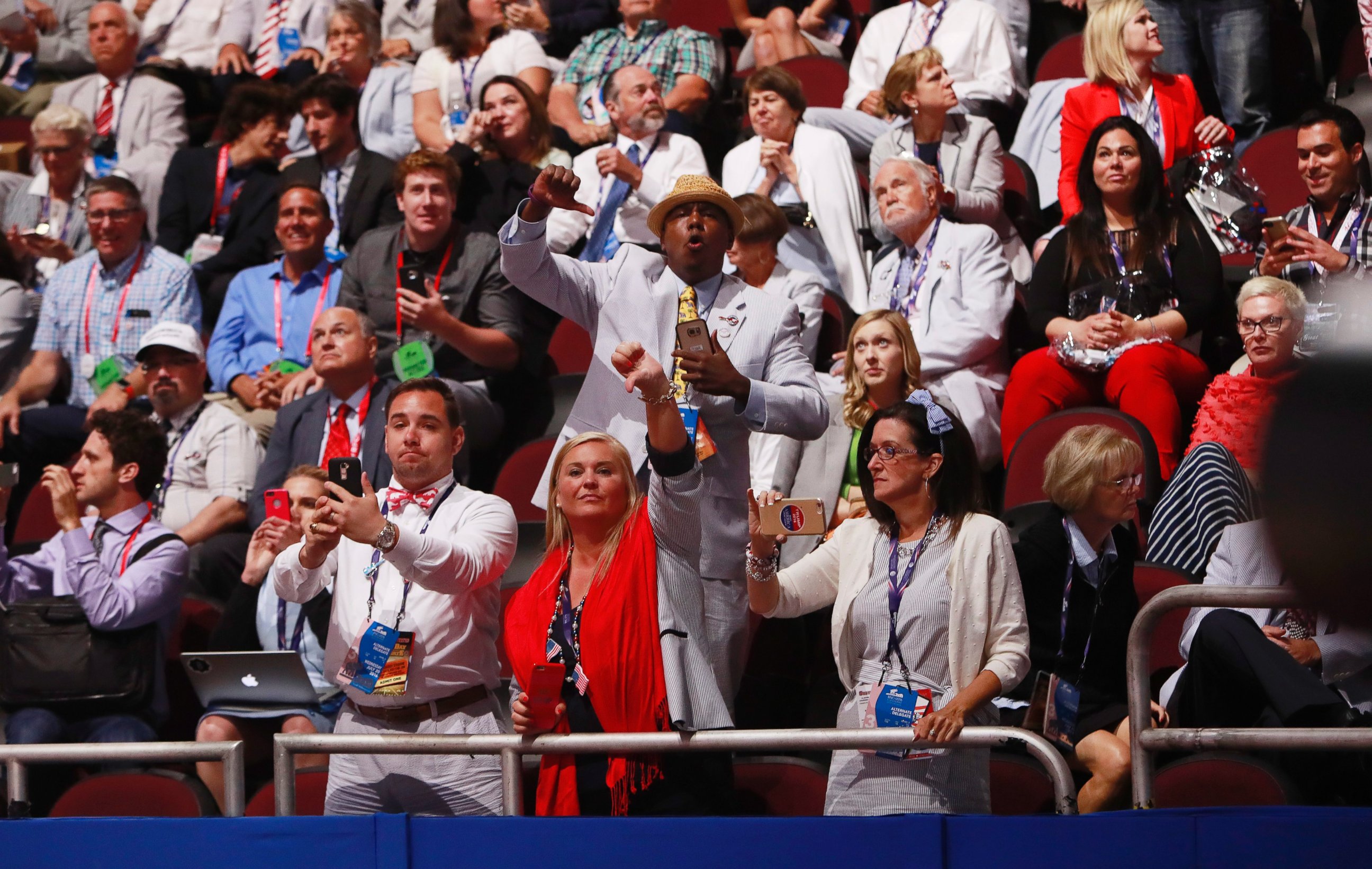 PHOTO:Alternates and guests react as Texas Senator and former Republican presidential hopeful Ted Cruz speaks during the third day of the 2016 Republican National Convention at Quicken Loans Arena in Cleveland, July 20, 2016.  