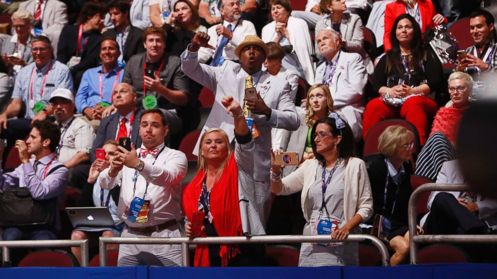 PHOTO:Alternates and guests react as Texas Senator and former Republican presidential hopeful Ted Cruz speaks during the third day of the 2016 Republican National Convention at Quicken Loans Arena in Cleveland, July 20, 2016.