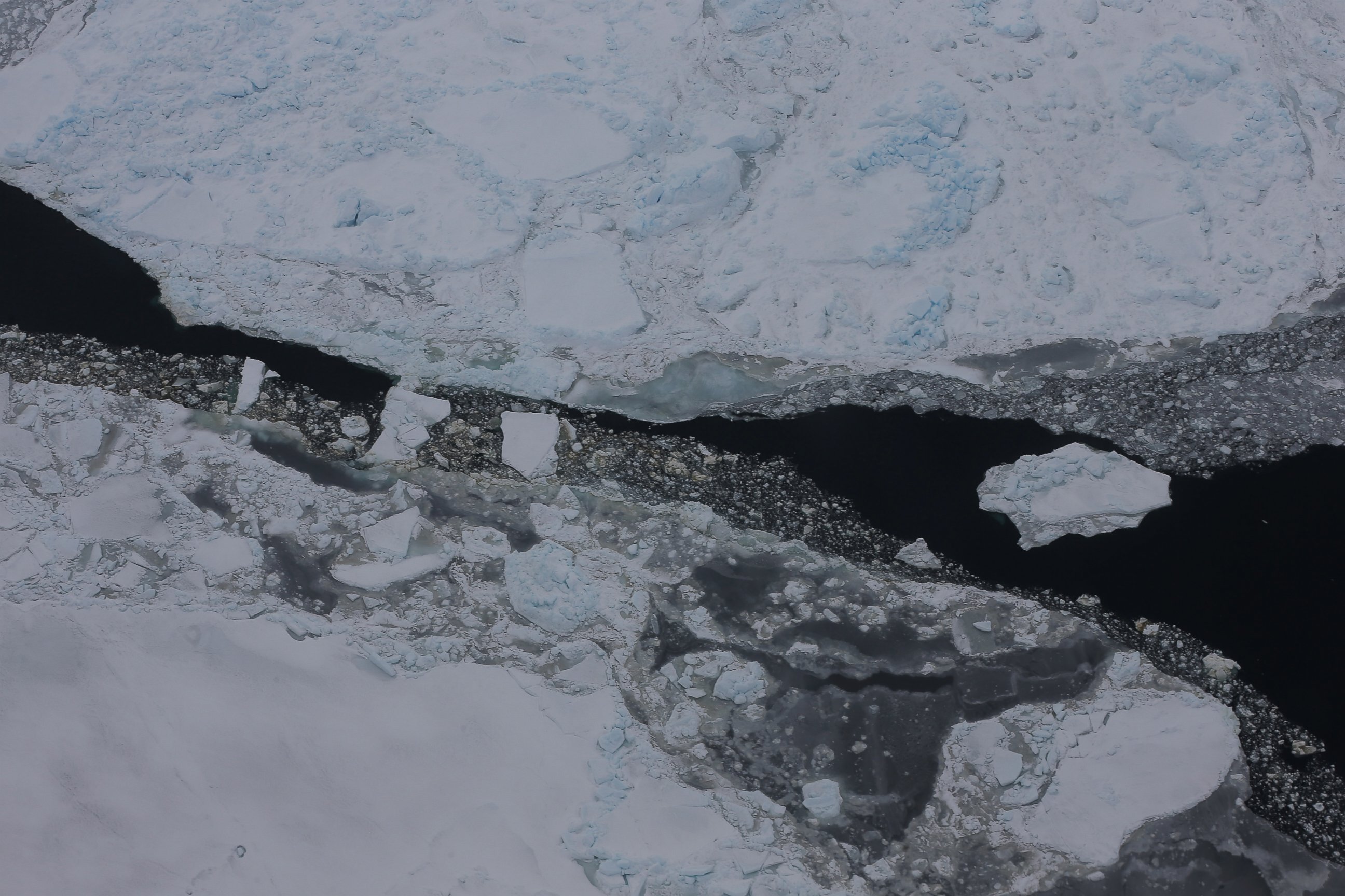 PHOTO: Ice floats near the coast of West Antarctica seen from a window of a NASA Operation IceBridge airplane, Oct. 27, 2016, in-flight over Antarctica.