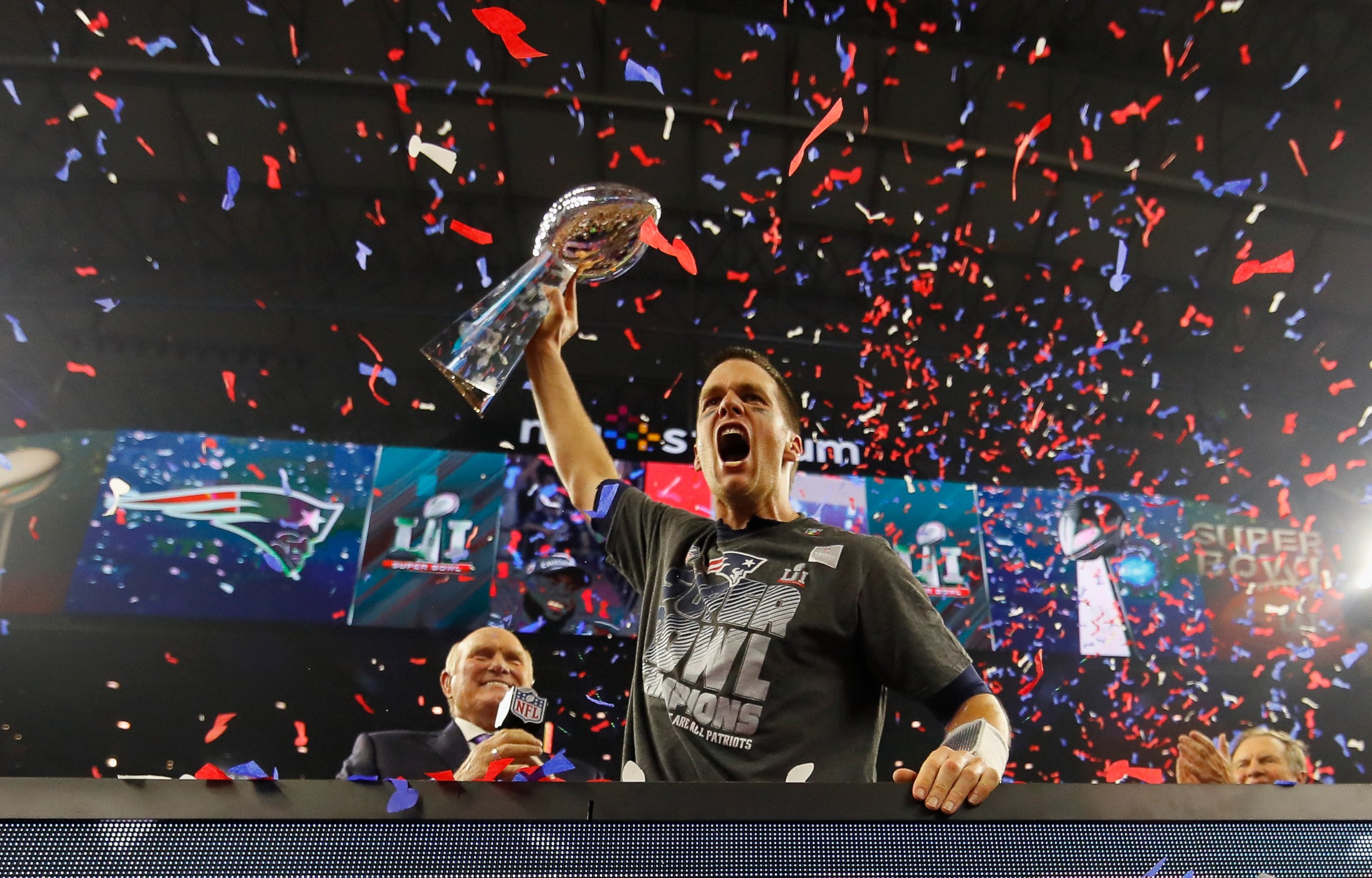 PHOTO: Quarterback Tom Brady of the New England Patriots raises the Vince Lombardi Trophy after defeating the Atlanta Falcons during Super Bowl 51,  February 5, 2017 in Houston, Texas. 