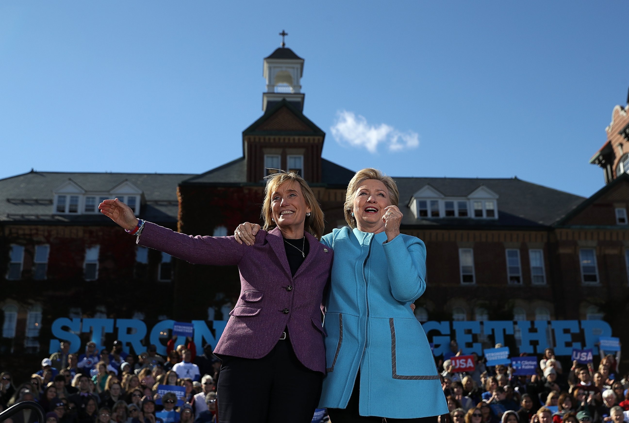 PHOTO: Democratic presidential nominee Hillary Clinton and New Hampshire Gov. Maggie Hassan look on during a campaign rally at Saint Anselm College on Oct. 24, 2016 in Manchester, New Hampshire. 