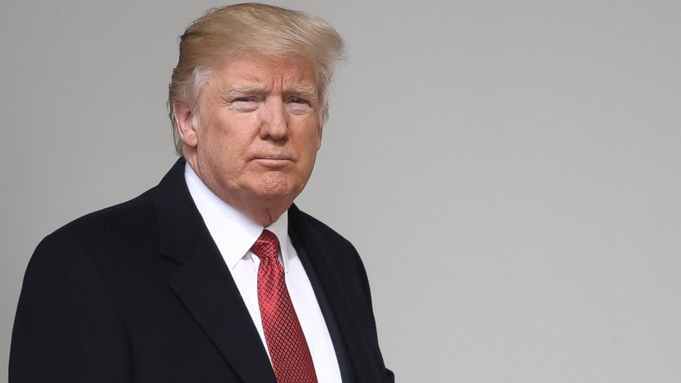 U.S. President Donald Trump walks to a waiting Marine One helicopter while departing the White House, on March 15, 2017, in Washington.  
