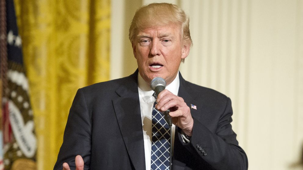 U.S. President Donald Trump makes remarks at a reception for U.S. Senators and their spouses in the East Room of the White House, on March 28, 2017, in Washington.