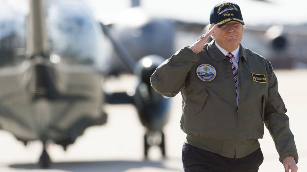 PHOTO: U.S. President Donald Trump salutes as he walks to Air Force One prior to departing from Langley Air Force Base in Virginia, March 2, 2017, as he traveled to Newport News, Va., to visit the pre-commissioned USS Gerald R. Ford aircraft carrier.