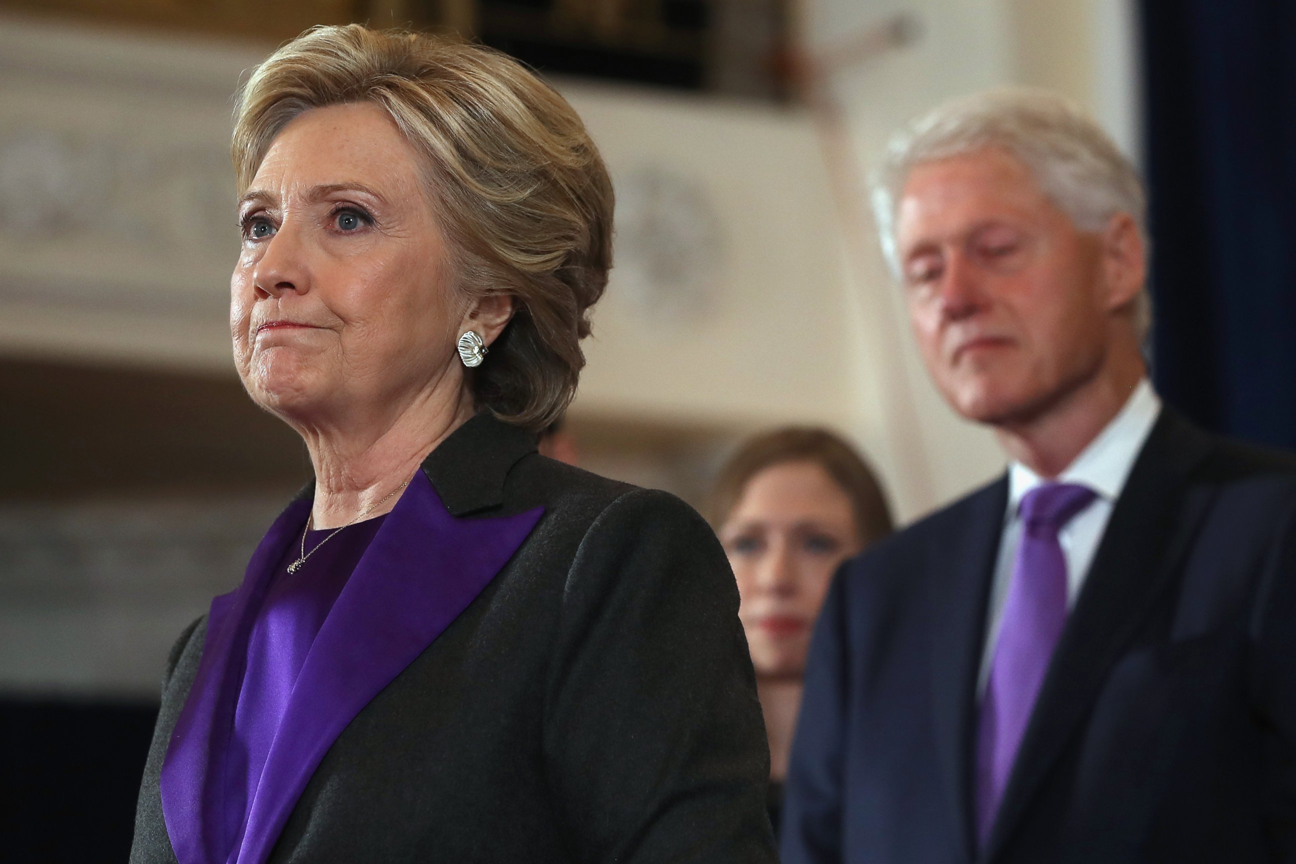 PHOTO: Former Secretary of State Hillary Clinton, accompanied by her husband former President Bill Clinton, pauses as she concedes the presidential election at the New Yorker Hotel, on Nov. 9, 2016, in New York City. 