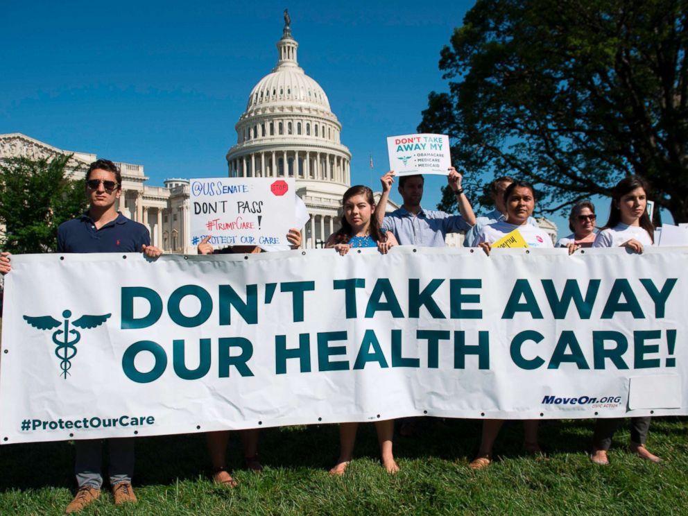 PHOTO: Protesters against the US Senate Republicans healthcare bill hold a rally outside the US Capitol in Washington, DC, June 28, 2017.