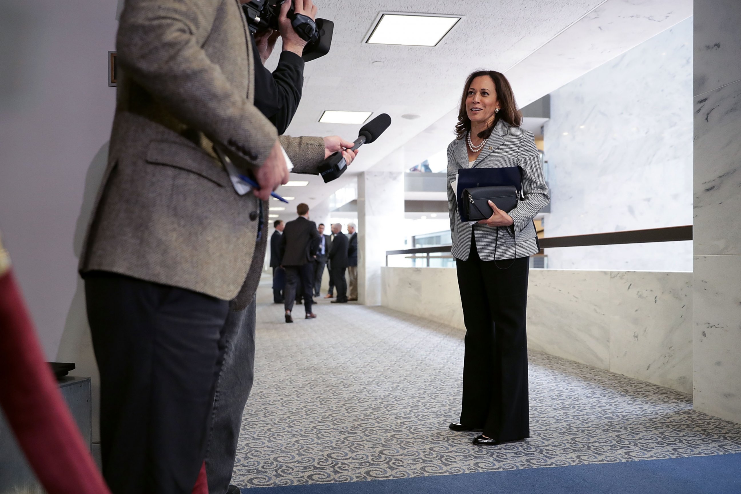 PHOTO: Senate Select Committee on Intelligence member Sen. Kamala Harris (D-CA) talks to journalists before attending a closed-door meeting in the Hart Senate Office Building on Capitol Hill, April 25, 2017, in Washington.