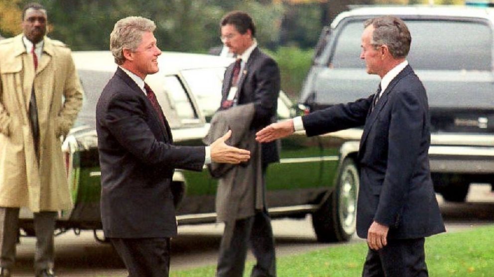 PHOTO: President George Bush greets President-elect Bill Clinton, Nov. 18, 1992 as Clinton arrived for his first post-election visit to the White House. 