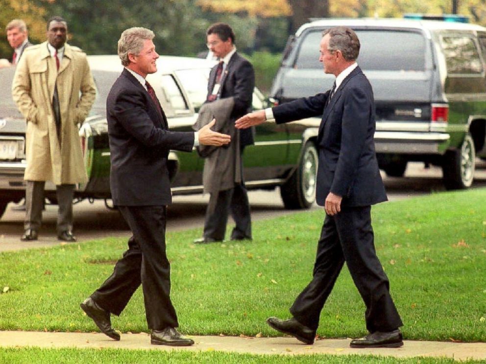 PHOTO: President George Bush greets President-elect Bill Clinton, Nov. 18, 1992 as Clinton arrived for his first post-election visit to the White House. 