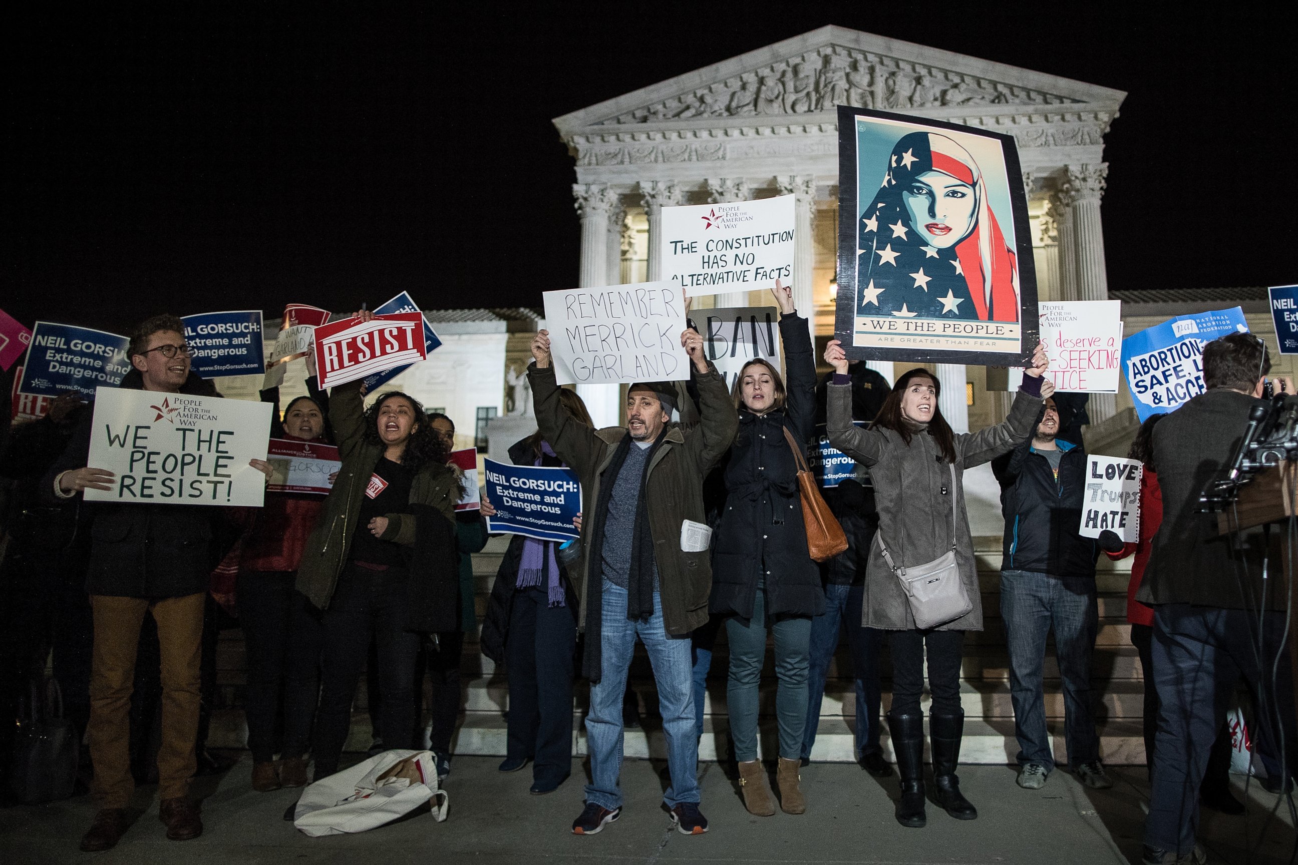 PHOTO: Protestors gather outside of the Supreme Court, Jan. 31, 2017, in Washington. 