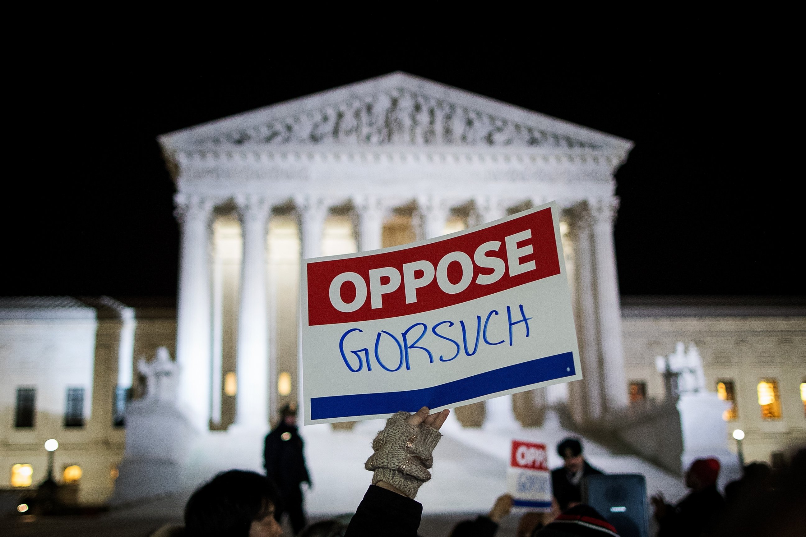 PHOTO: Protestors gather outside of the Supreme Court, Jan. 31, 2017, in Washington. 