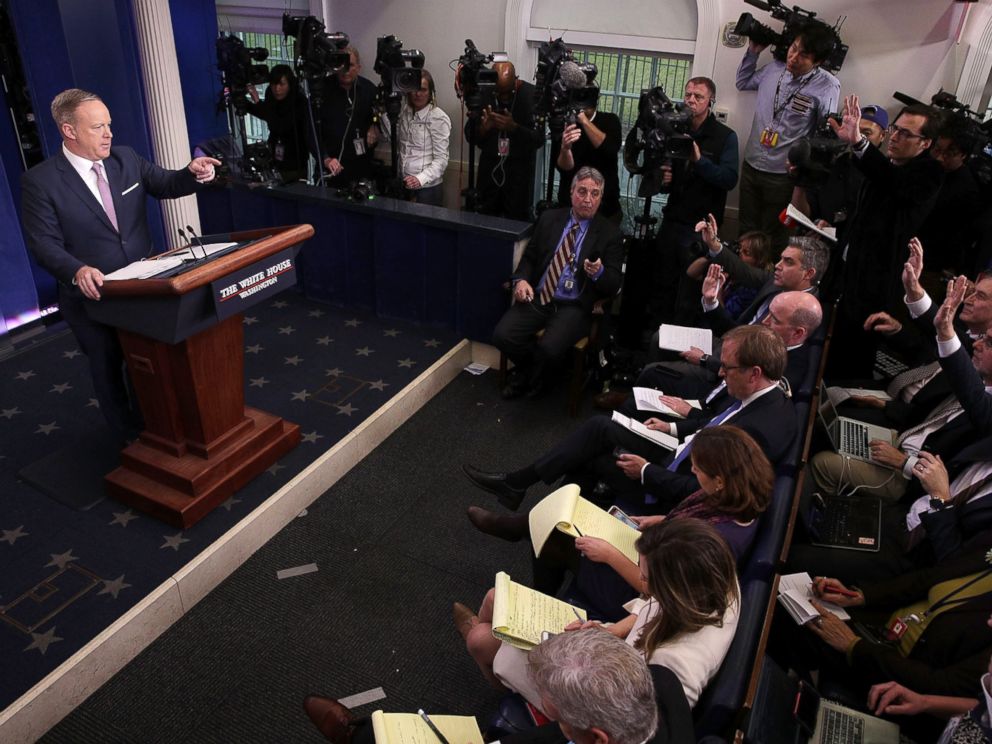 PHOTO: White House Press Secretary Sean Spicer (L) takes questions during a daily briefing at the James Brady Press Briefing Room of the White House January 23, 2017 in Washington.