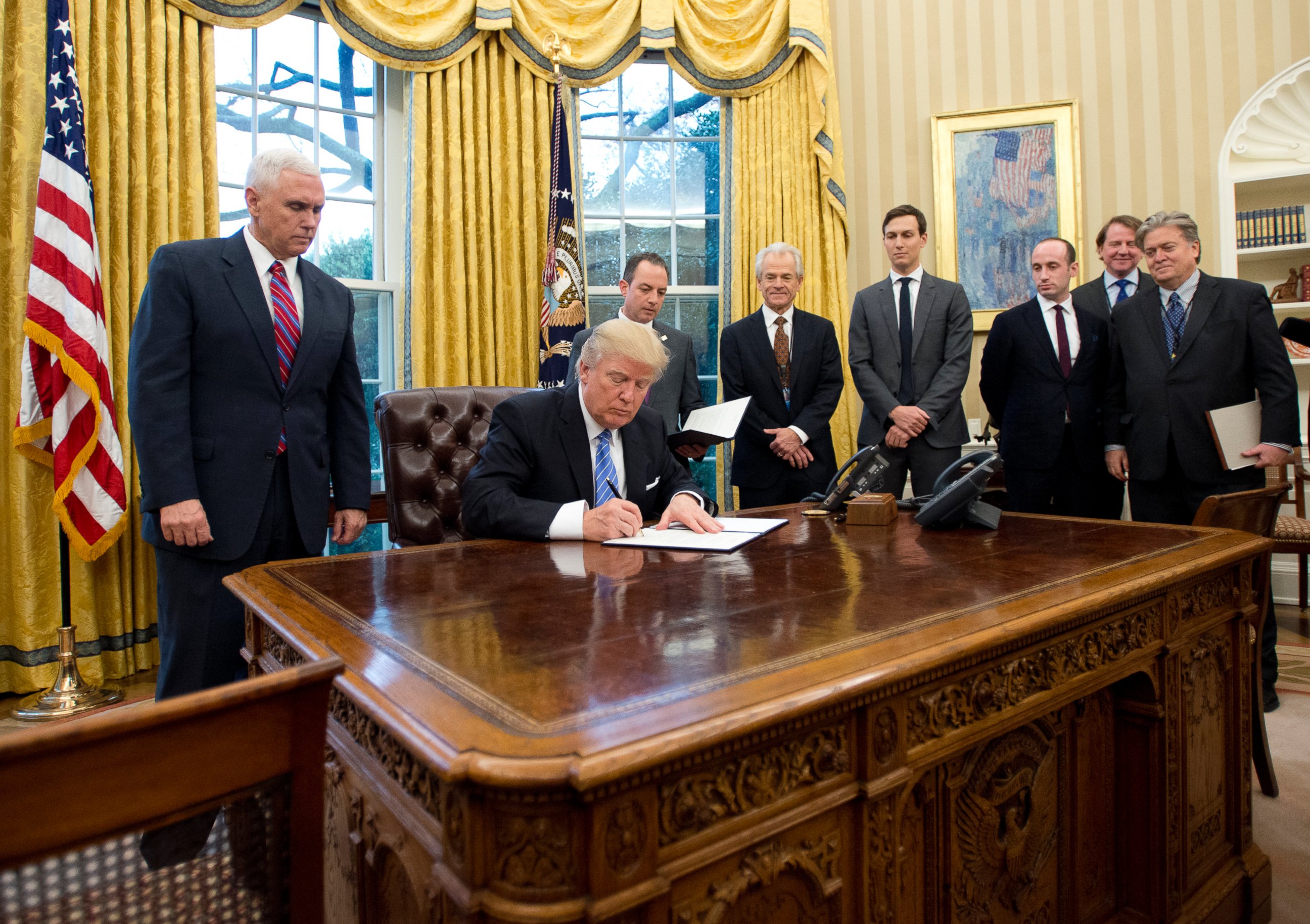 PHOTO: President Donald Trump signs the first of three Executive Orders in the Oval Office of the White House, Jan. 23, 2017.  The "Mexico City" executive order, which bans federal funding of abortions overseas, was one of them. 