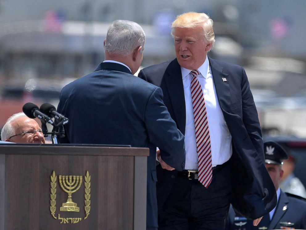PHOTO: President Donald Trump shakes hands with Israeli Prime Minister Benjamin Netanyahu during a welcome ceremony upon his arrival at Ben Gurion International Airport, in Tel Aviv, on May 22, 2017, as part of his first trip overseas.