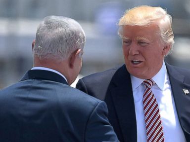 PHOTO: President Donald Trump shakes hands with Israeli Prime Minister Benjamin Netanyahu during a welcome ceremony upon his arrival at Ben Gurion International Airport, in Tel Aviv, on May 22, 2017, as part of his first trip overseas.