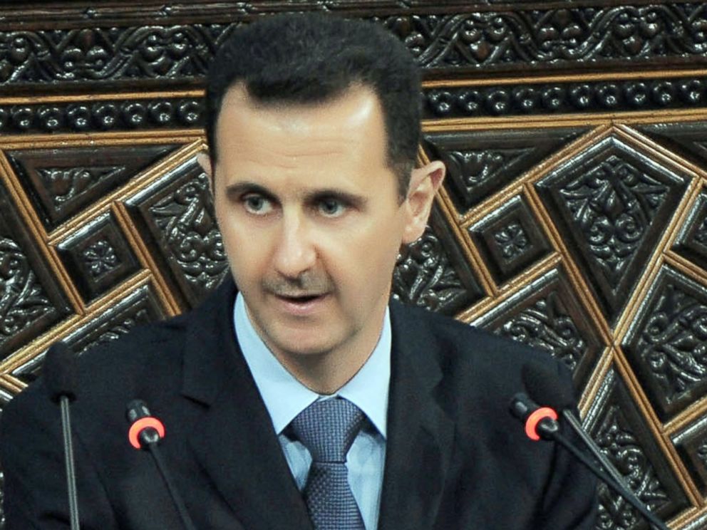 PHOTO: Syrian President Bashar Al-Assad addresses the parliament in Damascus, Syria, March 30, 2011.