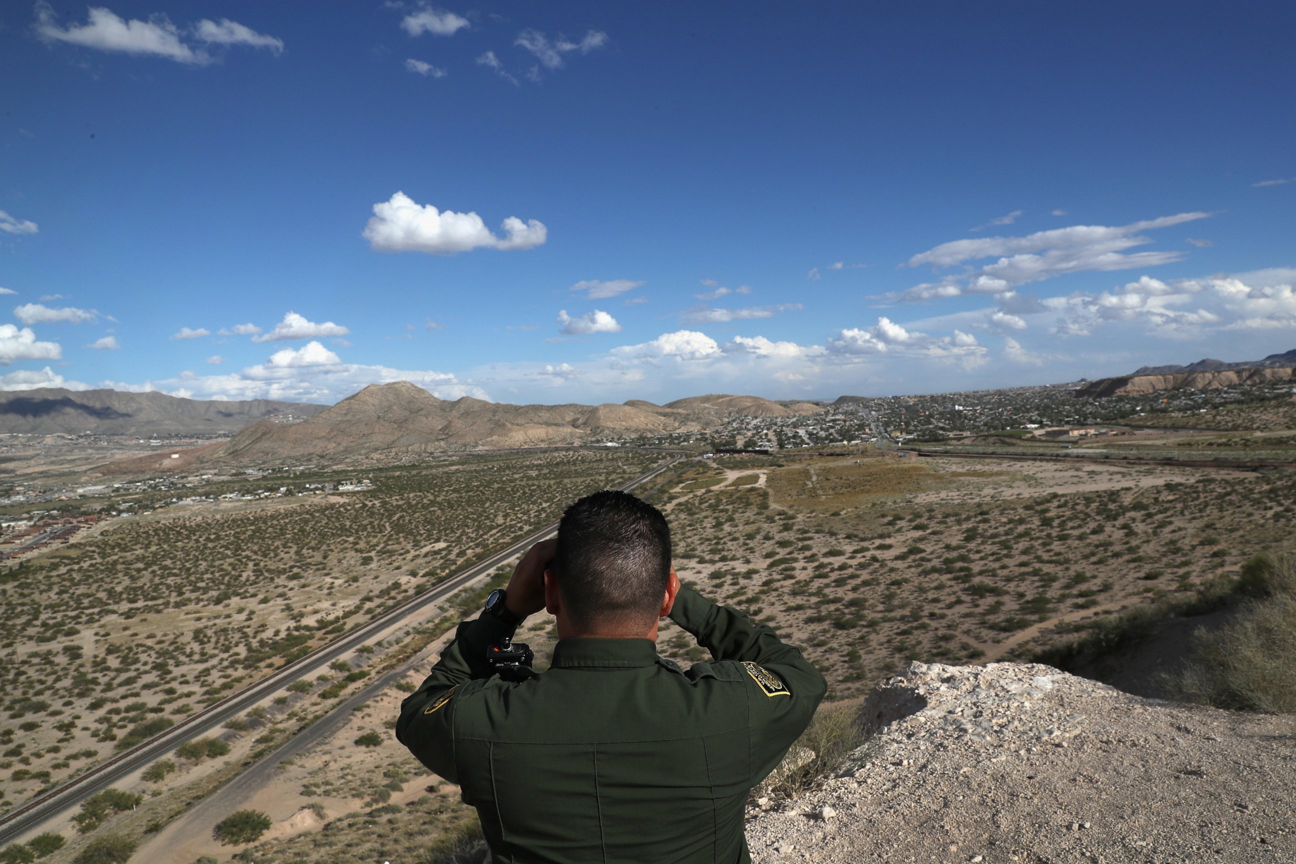 PHOTO: A U.S. Border Patrol agent scans the border with Mexico border, Oct. 3, 2016, in Sunland Park, New Mexico. 