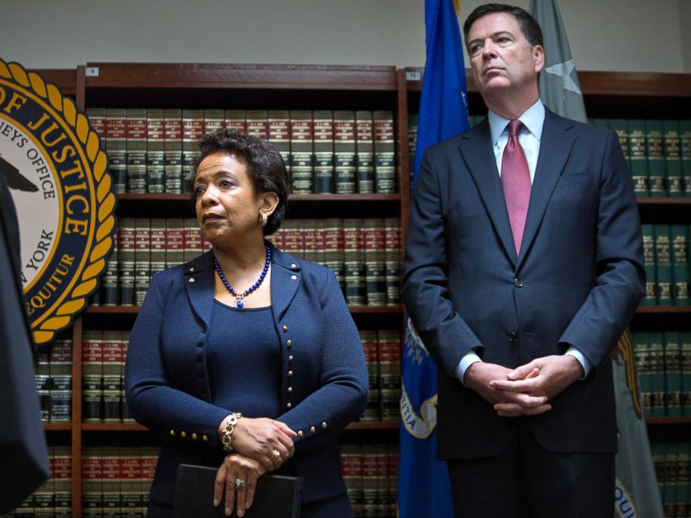 PHOTO: James Comey, director of the Federal Bureau of Investigation (FBI), right, and Loretta Lynch, U.S. attorney general, listen during a news conference, May 27, 2015.