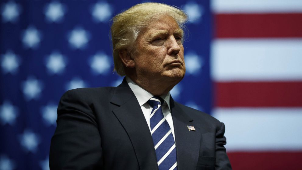 President-elect Donald Trump looks on during a rally at the DeltaPlex Arena, Dec. 9, 2016 in Grand Rapids, Michigan.
