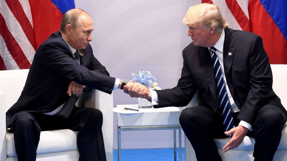 President Donald Trump and Russia's President Vladimir Putin shake hands during a meeting on the sidelines of the G20 Summit in Hamburg, Germany, July 7, 2017. 