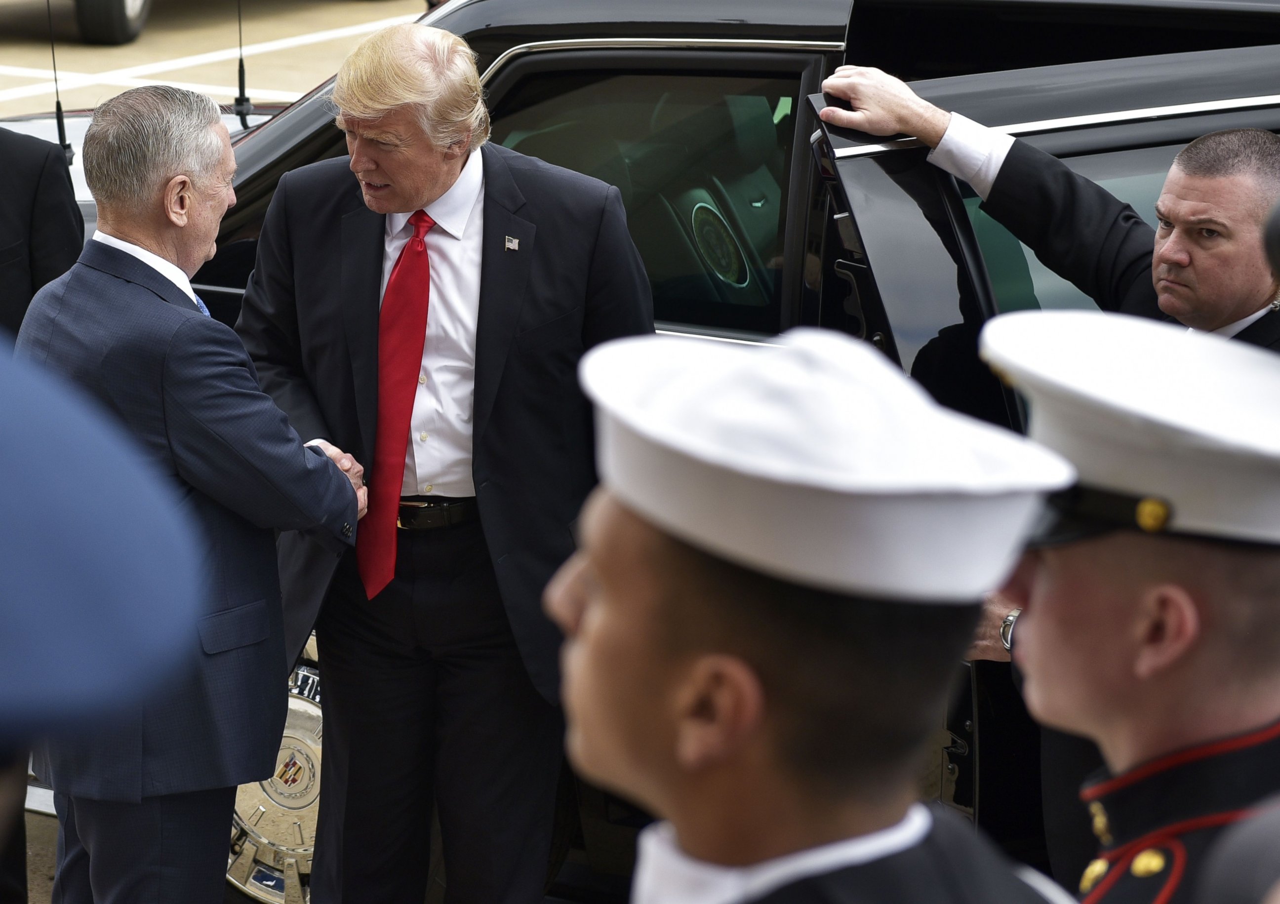 PHOTO: President Donald Trump is greeted by Defense Secretary James Mattis ahead of Mattis' ceremonial swearing-in, Jan. 27, 2016, at the Pentagon in Washington. 
