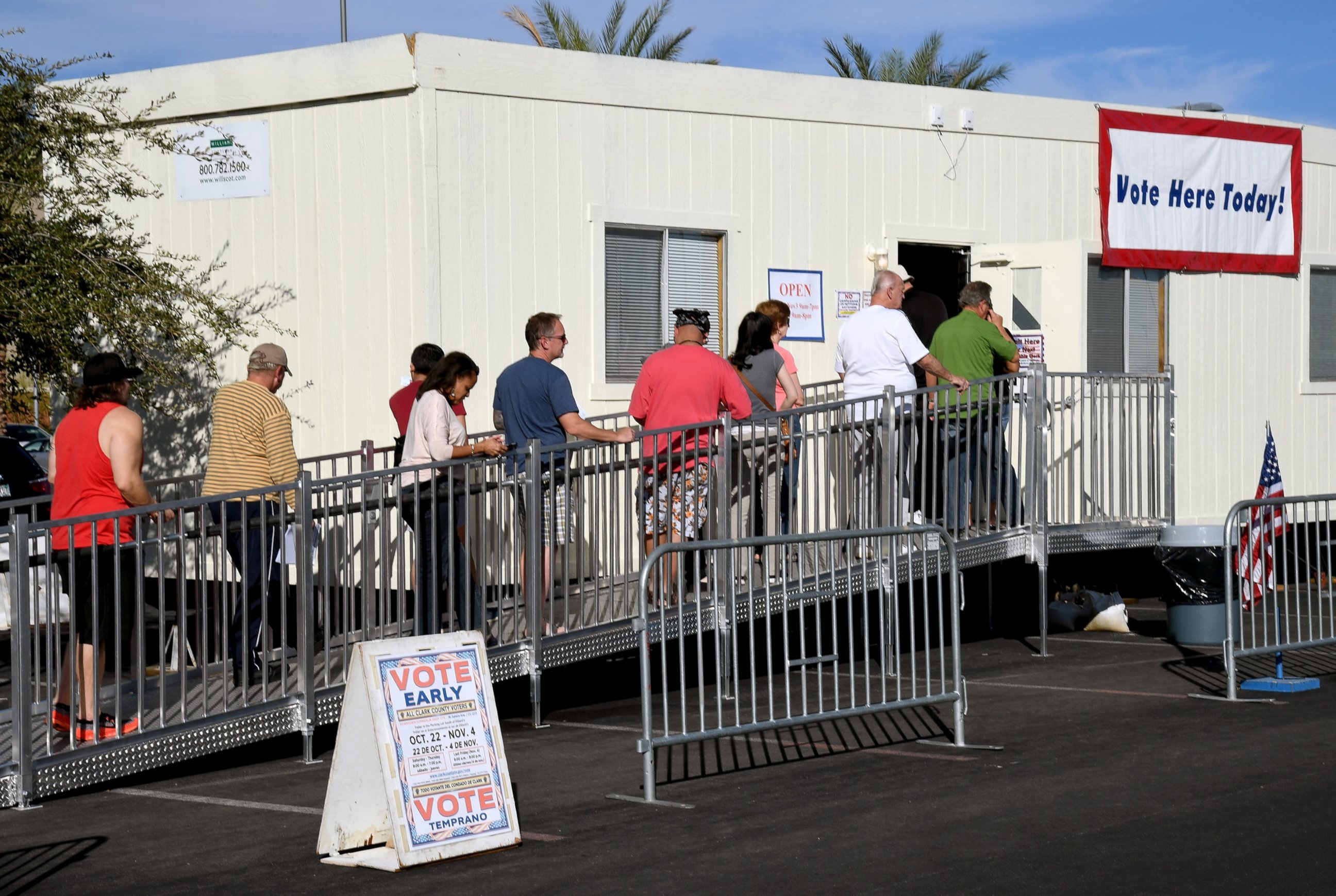 PHOTO: People wait in line to vote early at Downtown Summerlin on Oct. 26, 2016 in Las Vegas. 