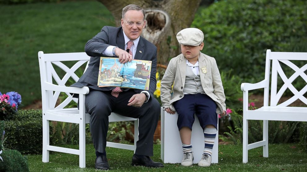 PHOTO: White House press secretary Sean Spicer reads the childrens' book "How To Catch The Easter Bunny" during the 139th Easter Egg Roll on the South Lawn of the White House, April 17, 2017, in Washington.