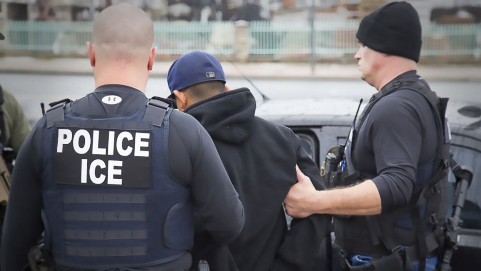 This image obtained Feb. 11, 2017 courtesy of the Immigration and Customs Enforcement (ICE) shows US Immigration and Customs Enforcement officers detaining a suspect during an enforcement operation on Feb. 7, 2017 in Los Angeles.  



