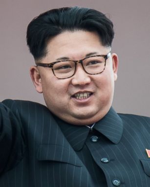 PHOTO: North Korean leader Kim Jong-Un waves from a balcony of the Grand People's Study House following a mass parade marking the end of the 7th Workers Party Congress in Kim Il-Sung Square in Pyongyang on May 10, 2016.