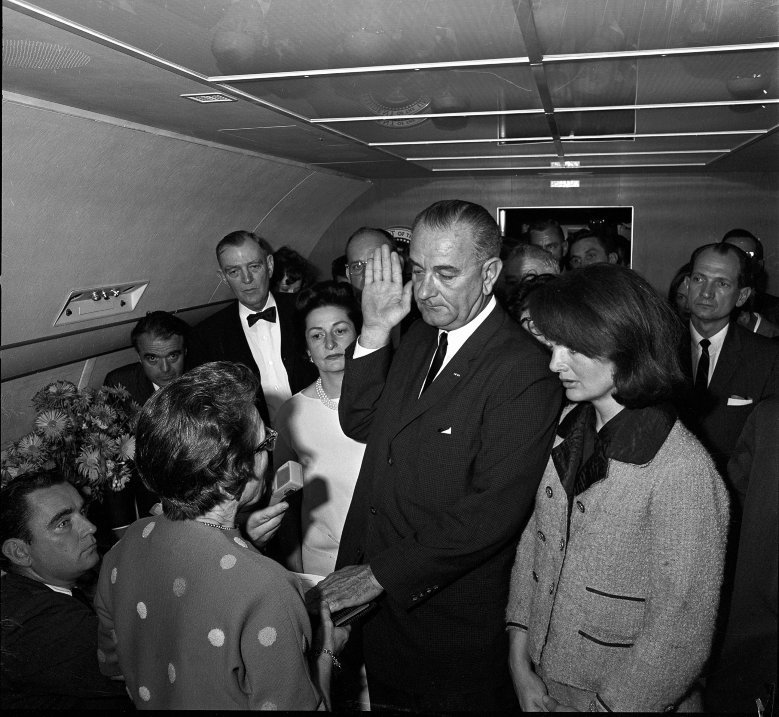 PHOTO: Vice-President Lyndon B. Johnson takes the oath of office to become the 36th President of the United States as he is sworn in on Air Force One after the assassination of John F. Kennedy, Nov. 22, 1963, in Dallas, Texas.
