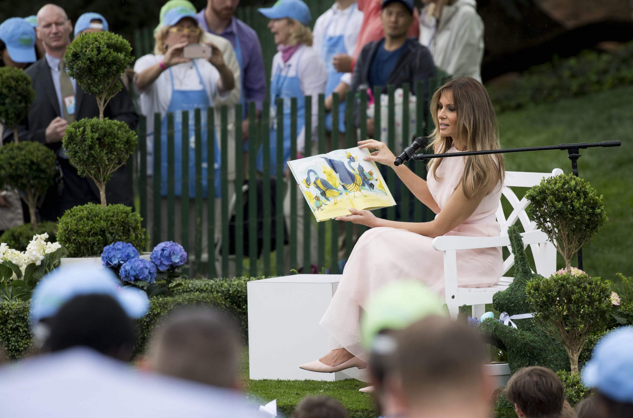 PHOTO: First lady Melania Trump reads a book during the 139th White House Easter Egg Roll on the South Lawn of the White House in Washington, April 17, 2017.