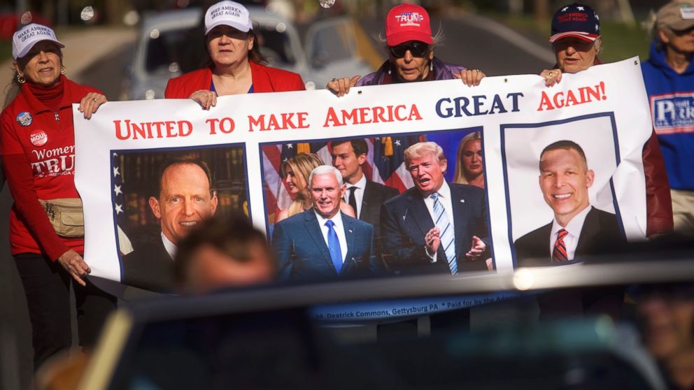 PHOTO: Donald Trump supporters, including (2nd R) Elizabeth Hower and (R) Happy Freas, march in the Harvest Festival Parade, Oct. 22, 2016 in New Oxford, Pennsylvania.  