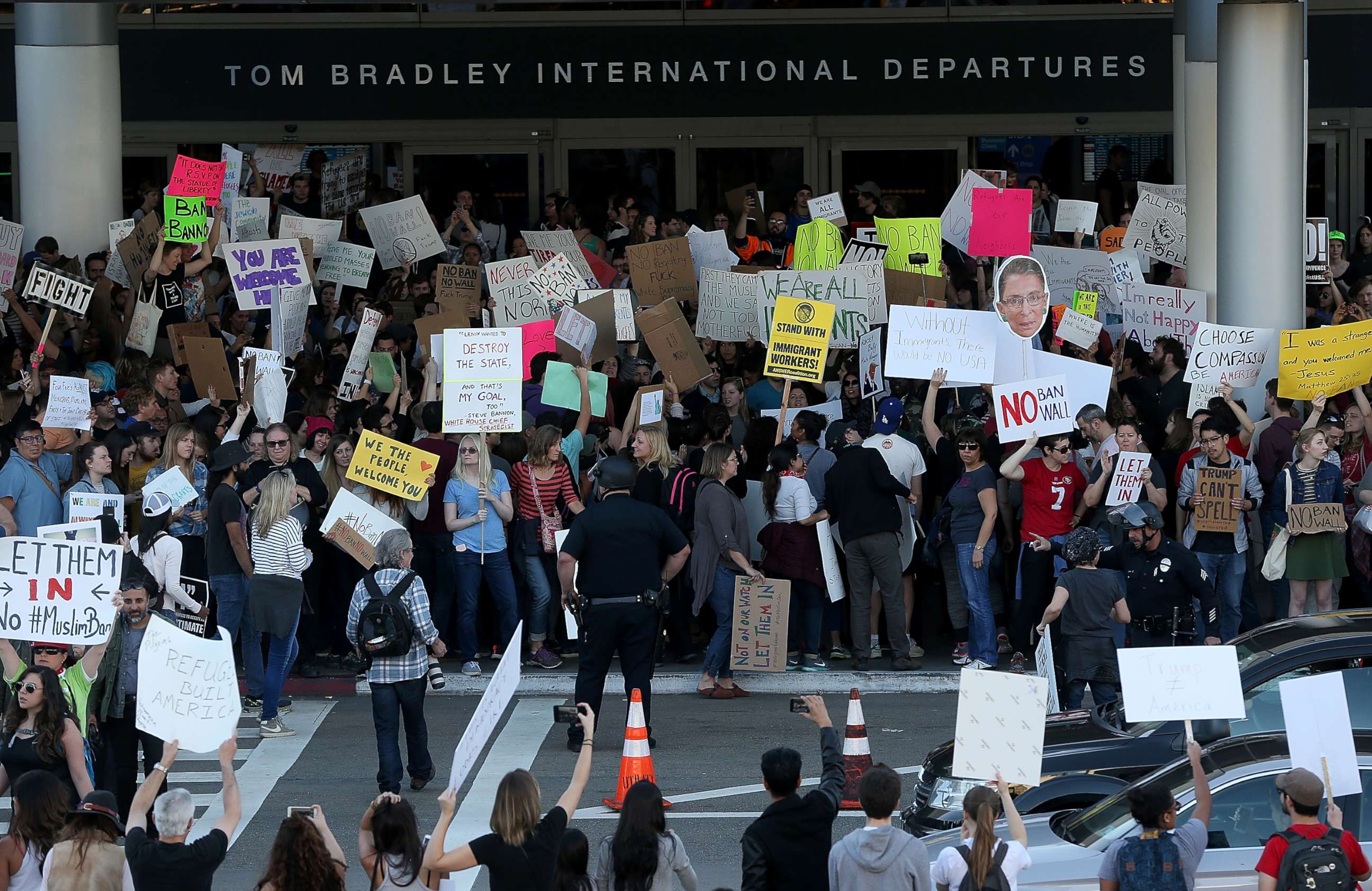 PHOTO: Protesters hold signs during a demonstration against the immigration ban that was imposed by U.S. President Donald Trump at Los Angeles International Airport, Jan. 29, 2017.