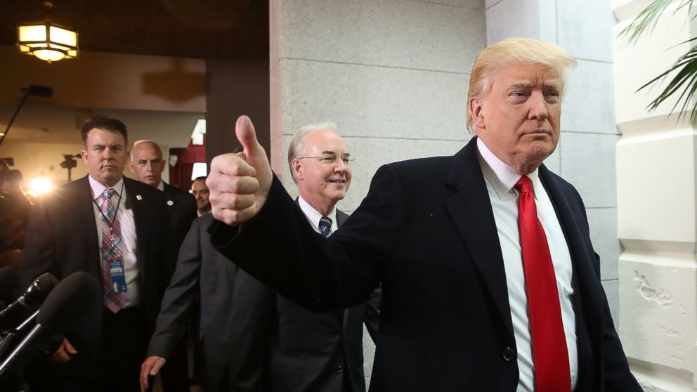 President Donald Trump gives a thumbs up as he and HHS Secretary Tom Price walk to a House Republican closed party conference on Capitol Hill, March 21, 2017, in Washington.