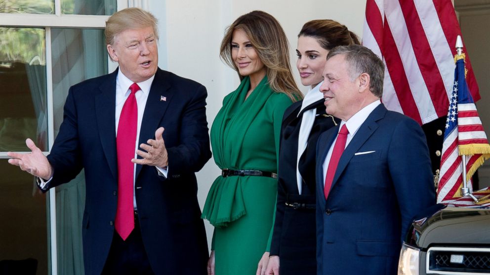 President Donald Trump and first lady Melania Trump welcome Jordan's Queen Rania and Jordan's King Abdullah II outside the West Wing of the White House, April 5, 2017, in Washington.
