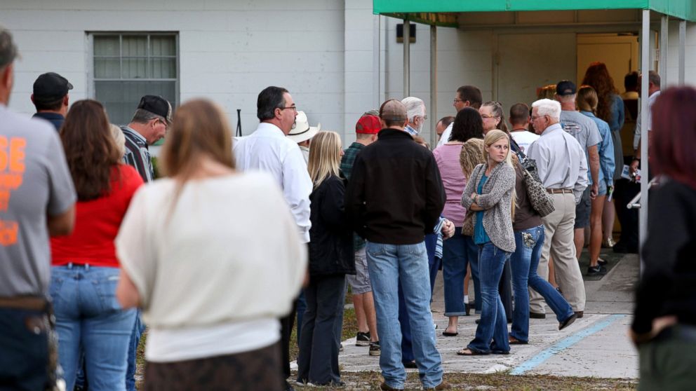 PHOTO: Voters wait in a queue to cast their ballots in the presidential election at a polling station in Christmas, Florida, Nov. 8, 2016.