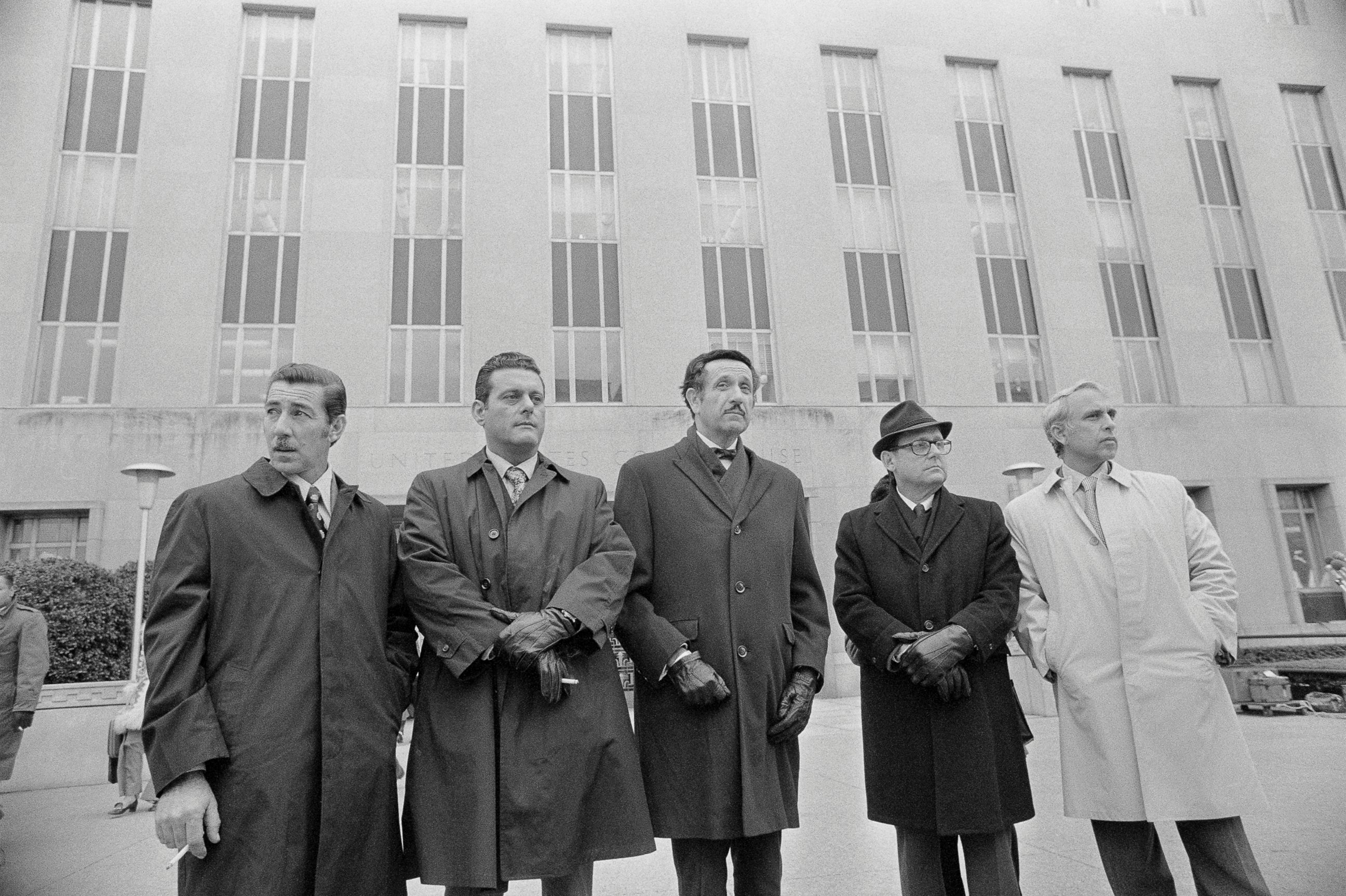 PHOTO: Virgilio Gonzales, Frank Sturgis, attorney Henry Rothblatt, Bernard Barker and Eugenio Martinez the defendants charged with breaking into the Democratic National Committee offices at the Watergate complex  during their trial at a district court.