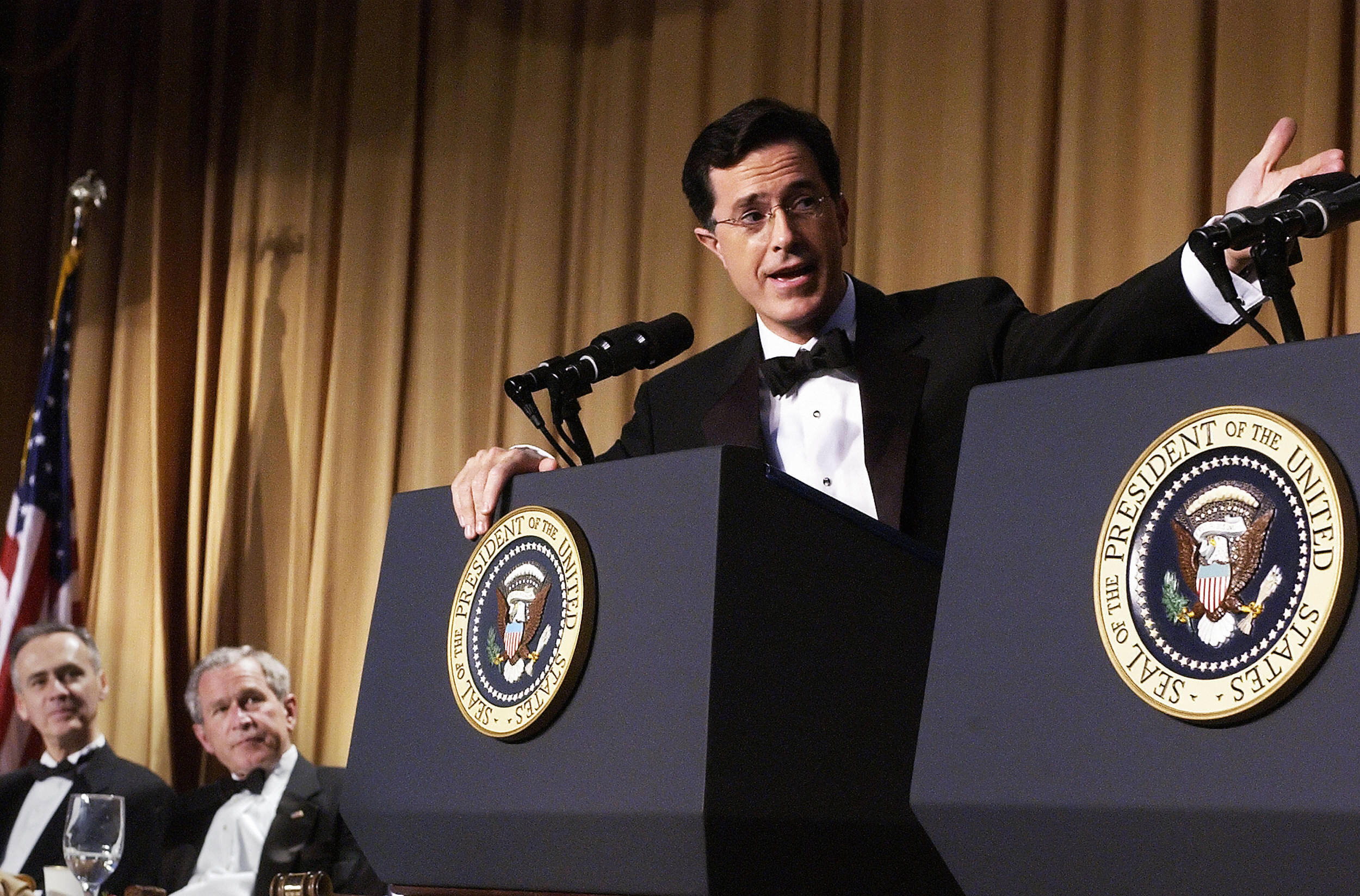 PHOTO: Guest host Stephen Colbert speaks as then-President George W. Bush and Tom Curley of the Associated Press look on at the White House Correspondents' Association Dinner, April 29, 2006, at the Washington Hilton Hotel in Washington.