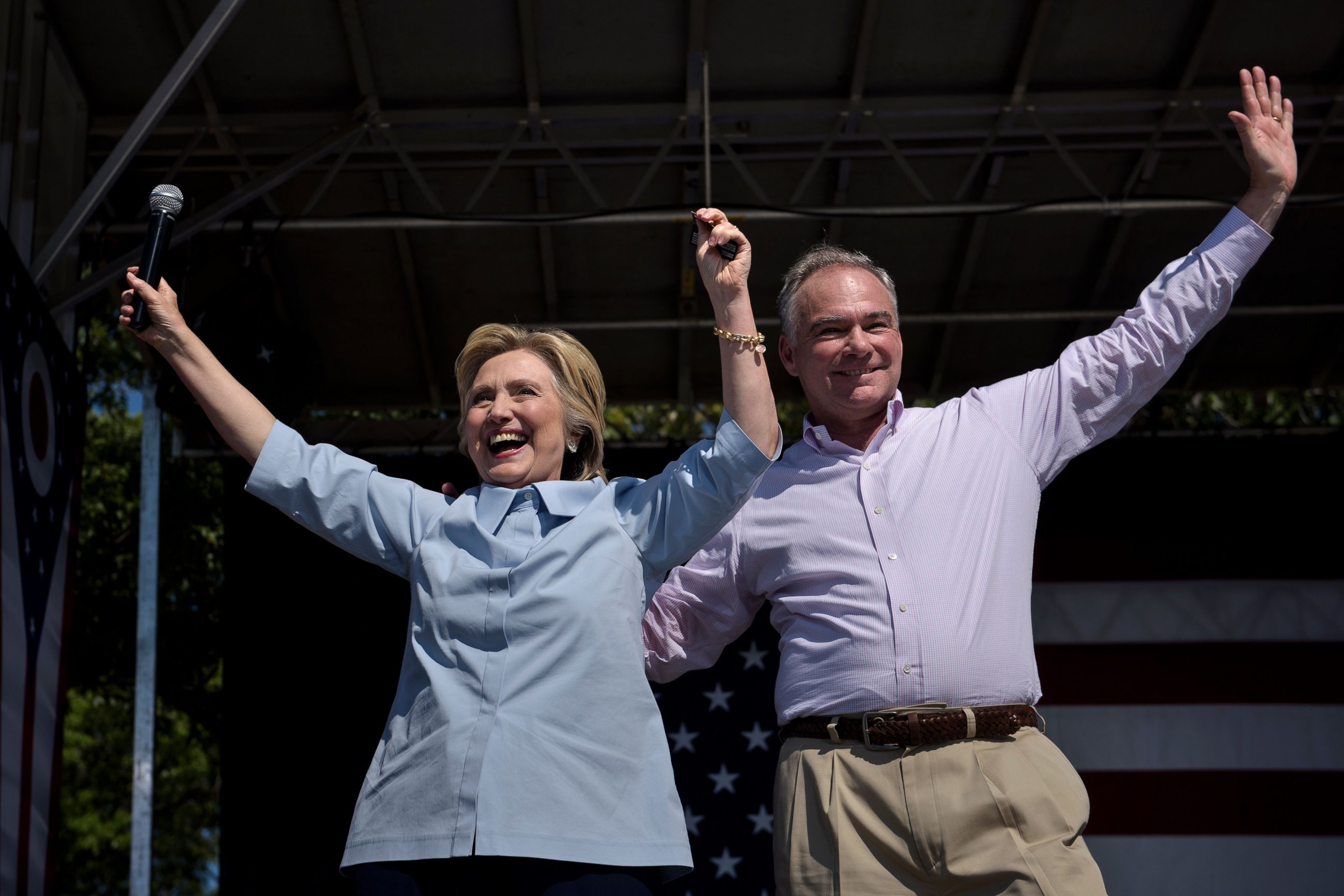 PHOTO:Democratic presidential nominee Hillary Clinton (L) and her running mate Tim Kaine cheer during a Labor Day rally September 5, 2016 in Cleveland, Ohio.