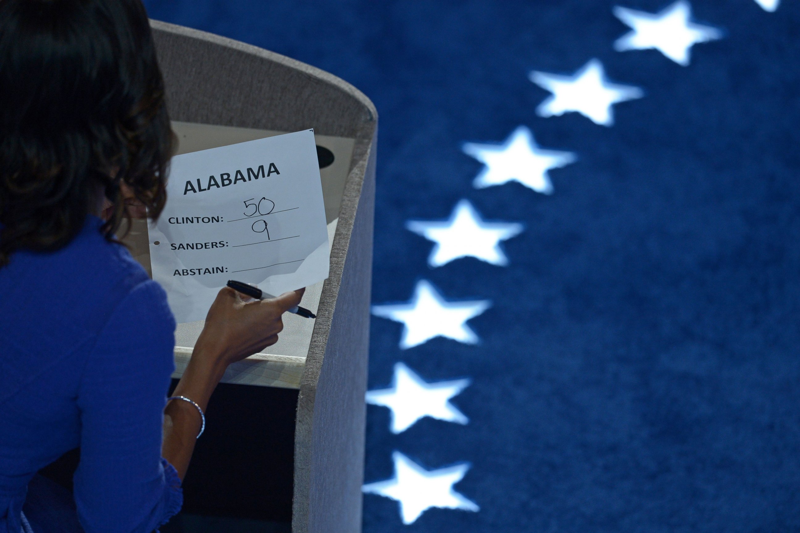 PHOTO: A staffer tallies the vote of the Alabama delegation during the roll call on Day 2 of the Democratic National Convention in Philadelphia, July 26, 2016. 