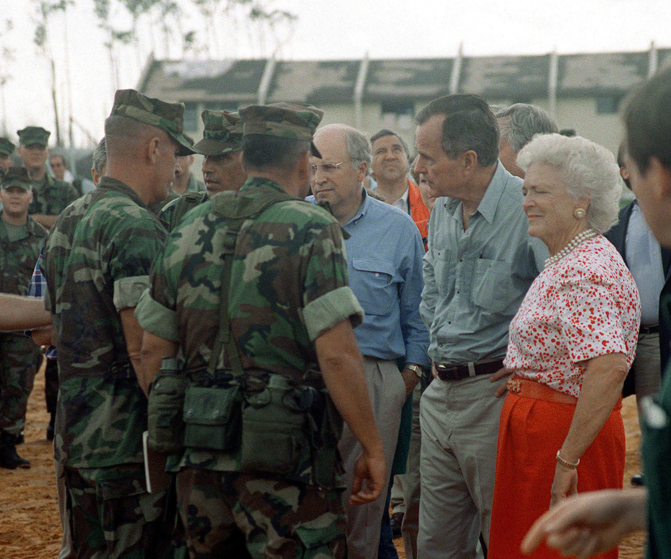 PHOTO: President George Bush, Barbara Bush, and Secretary of Defense Richard Cheney visit with Marines taking part in the disaster relief efforts in the aftermath of Hurricane Andrew, in Homestead, Florida, on Sept. 1, 1992.