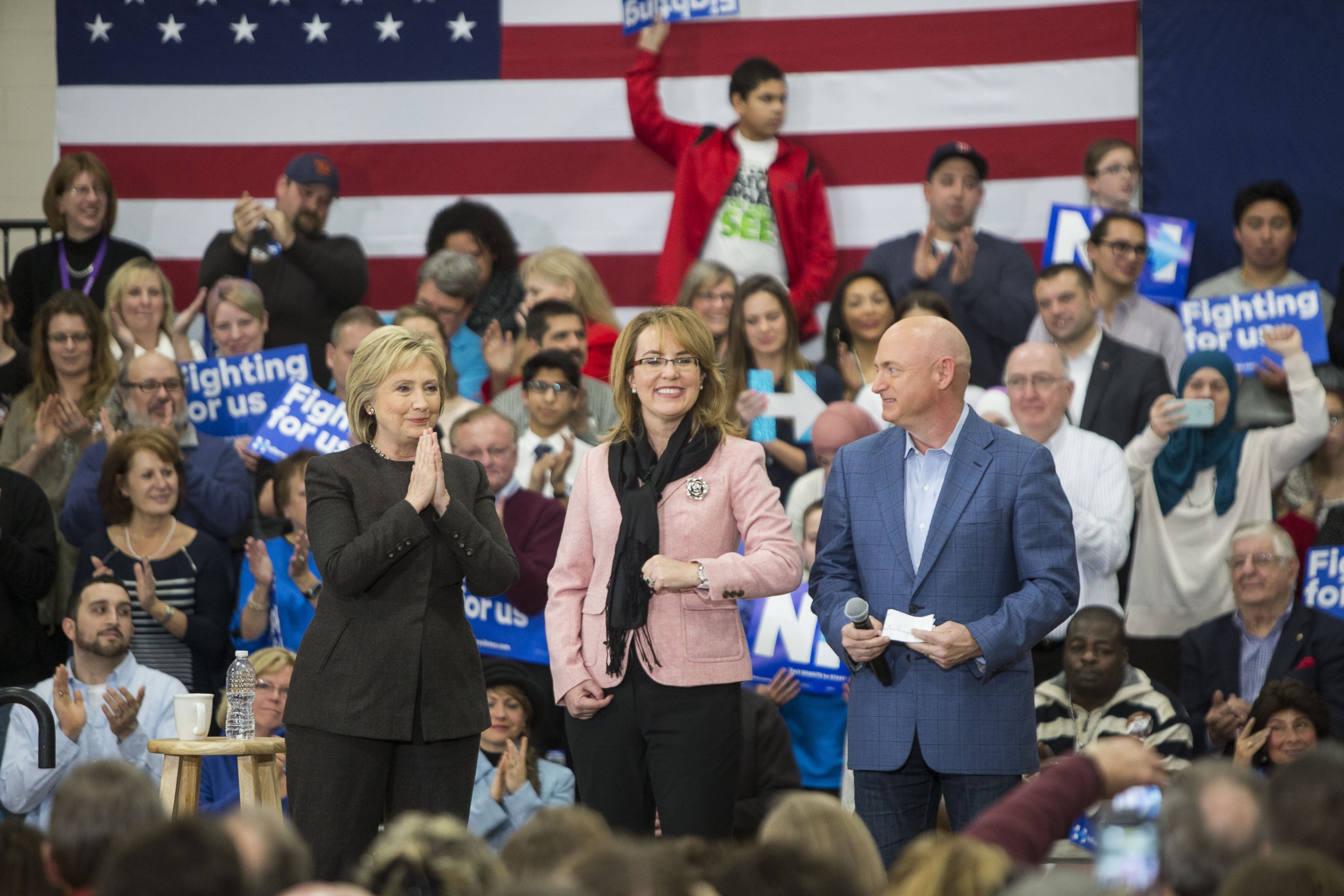 PHOTO: Hillary Clinton, Democratic presidential candidate, stands on stage with Gabrielle Giffords, former U.S. Representative from Arizona, center, and her husband astronaut Mark Kelly during a campaign event in Manchester, N.H., Feb. 3, 2016.
