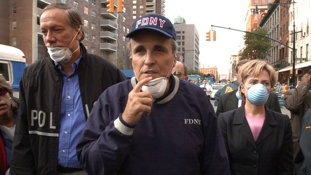 PHOTO:New York Governor George Pataki, left, New York City Mayor Rudolph Giuliani, center, and Senator Hillary Rodham Clinton, tour the site of the World Trade Center attacks on Sept. 12, 2001 in New York. 