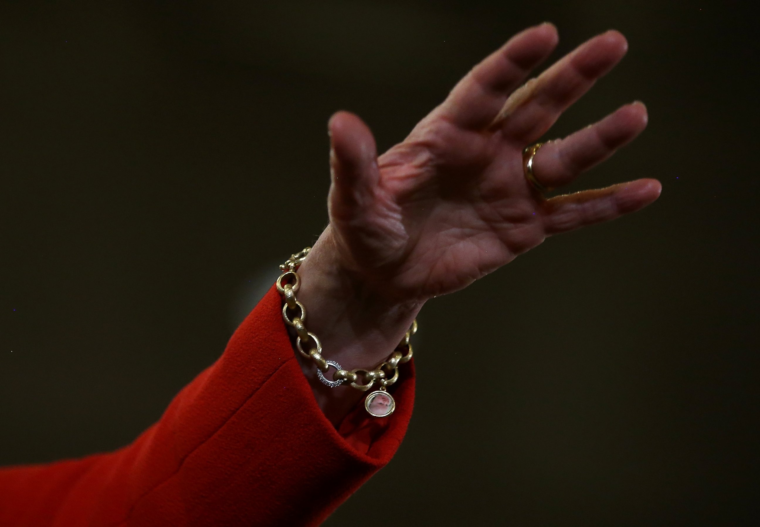 PHOTO: Democratic presidential candidate Hillary Clinton wears a charm bracelet with an image of her granddaughter Charlotte Clinton Mezvinsky as she speaks during a Bronx Organizing Event on April 13, 2016 in the Bronx borough of New York.