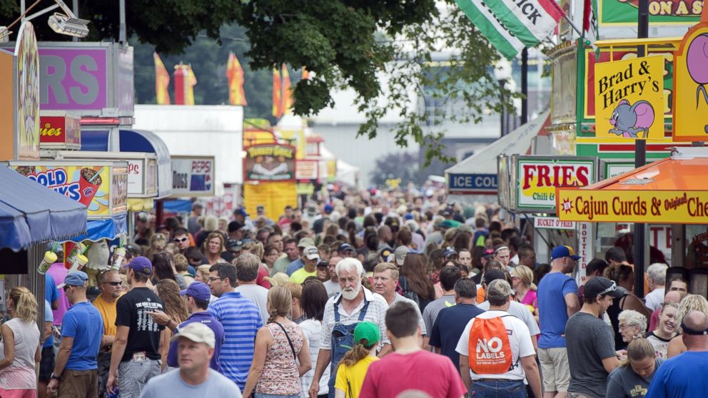 PHOTO: Guests walk though the 2014 Iowa State Fair in Des Moines, Iowa on Aug. 9, 2014. 