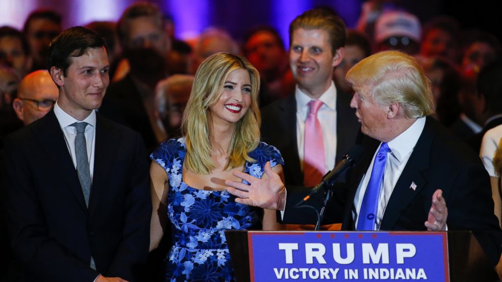 Jared Kushner (L) looks on as his wife Ivanka Trump smiles at her father, Republican presidential front runner Donald Trump, during his speech to supporters and the media at Trump Tower in Manhattan, on May 3, 2016 in New York City.