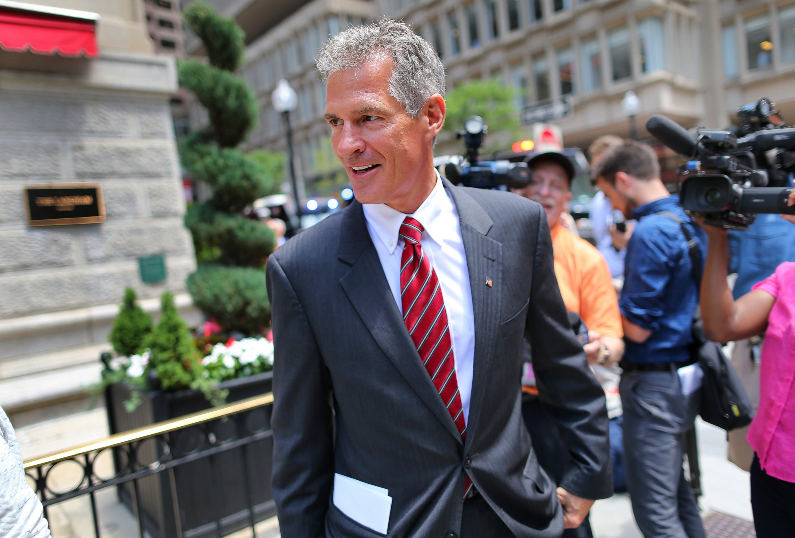 PHOTO: Former Senator Scott Brown leaves the Langham Hotel in Post Office Square where he attended a fundraising event for Republican presidential candidate Donald Trump in Boston, June 29, 2016.