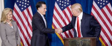 PHOTO: Republican presidential candidate Mitt Romney, center, shakes hands with Donald Trump after Trump endorsed Romney's presidential bid Feb. 2, 2012, at the Trump International Hotel in Las Vegas. Romney's wife, Ann is at left.