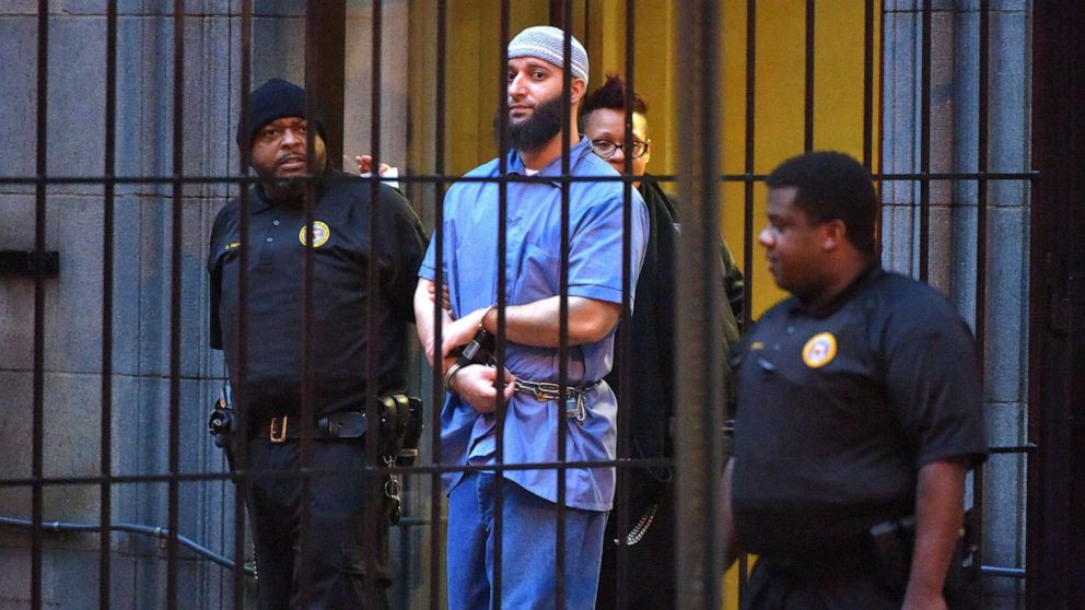 PHOTO: Officials escort "Serial" podcast subject Adnan Syed from the courthouse following the completion of the first day of hearings for a retrial in Baltimore, Feb. 3, 2016.