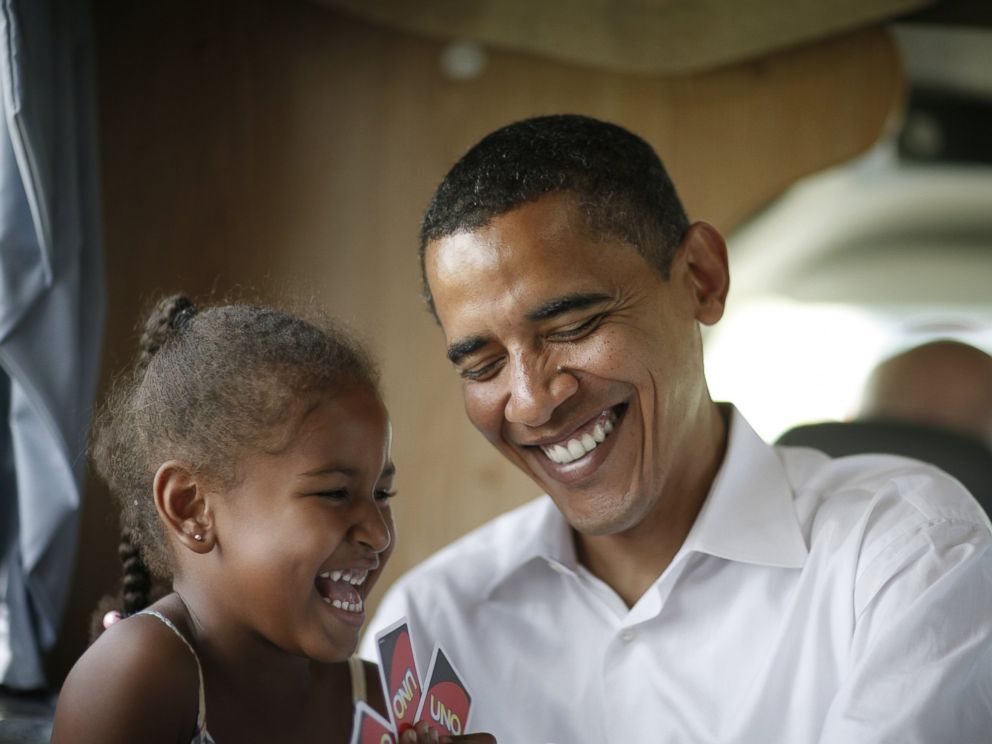 PHOTO: Democratic presidential hopeful Senator Barack Obama, D-IL, his wife Michelle and two daughters Sasha (6) and Malia (9) play cards in their RV, July 4, 2007 on a campaign swing between Oskaloosa and Pella, Iowa.